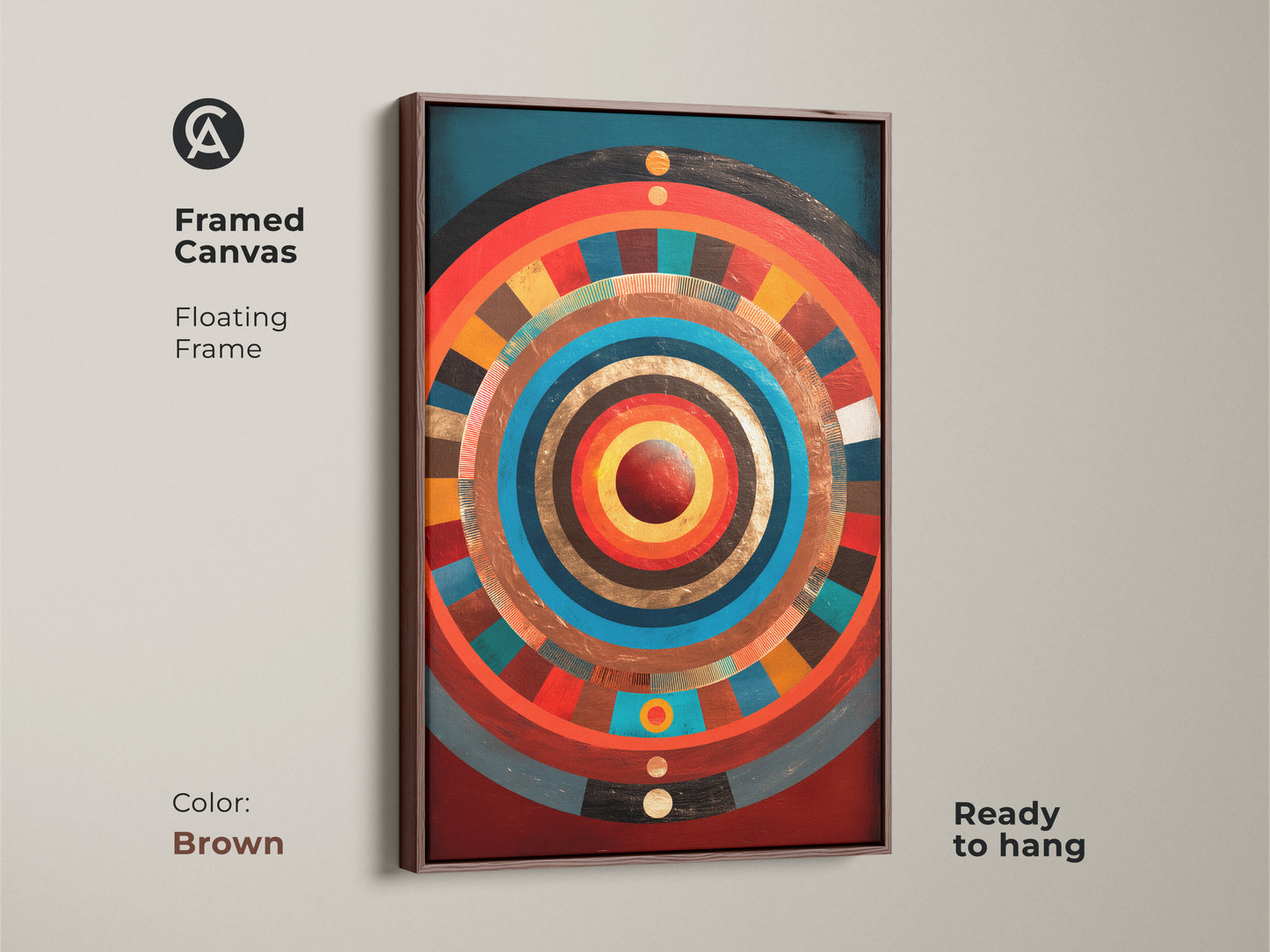 Framed canvas with a brown floating frame. It displays concentric circle artwork in gold teal and crimson tones. Ready to hang abstract expressionism canvas art for a modern space. Ideal for eclectic living room decor or a housewarming gift. A premium art print.