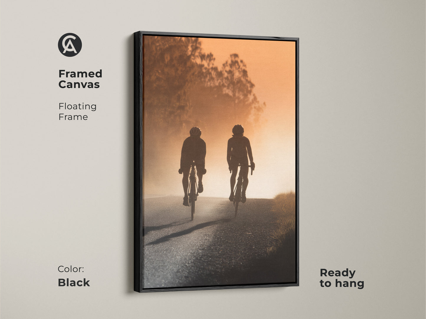 Framed canvas art featuring a cycling couple silhouette. The modern road artwork has a floating black frame and is ready to hang. Perfect modern entryway home decor or a unique gift for cyclists. Captures a sense of journey and shared experience.