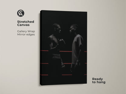 Stretched canvas featuring minimalist boxer artwork. This black and white canvas art shows two boxers facing each other in a ring. It's a perfect industrial loft decor piece ready to hang. This motivational boxer wall art is ideal for sports enthusiasts. A unique gift for boxing fans.