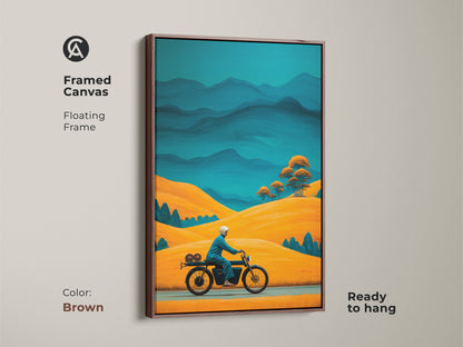Framed canvas with a brown floating frame featuring a retro motorcycle print. Golden yellow hills and teal blue mountains create a Mid-Century Modern art. Road trip lovers will adore this adventure travel decor that's ready to hang.
