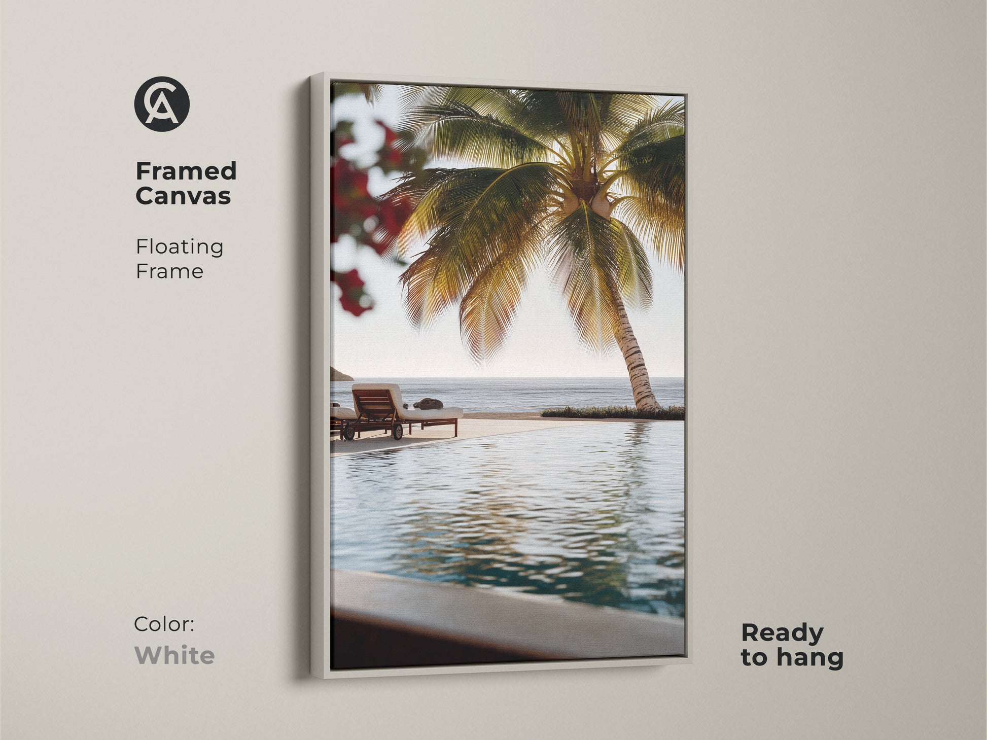 Framed Canvas in White of Beachside Paradise. Floating frame is ready to hang. This contemporary coastal artwork brings a tropical aesthetic. Serene ocean landscape print with a photorealistic palm tree and lounge chairs. Blue water canvas art for your home.