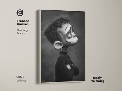 Framed canvas with a floating frame in white featuring a gothic Frankenstein boy. This ready-to-hang artwork is a unique gift. The black and white monster illustration complements eclectic home decor.