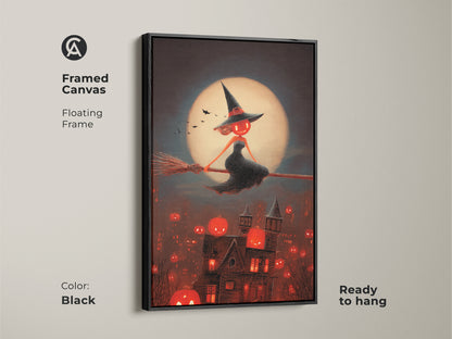 Framed canvas with a black floating frame. It is ready to hang with Halloween witch art. Spooky gothic wall decor features a jack-o-lantern town print. Dark fantasy art for Halloween enthusiasts.  Eclectic home decor art.