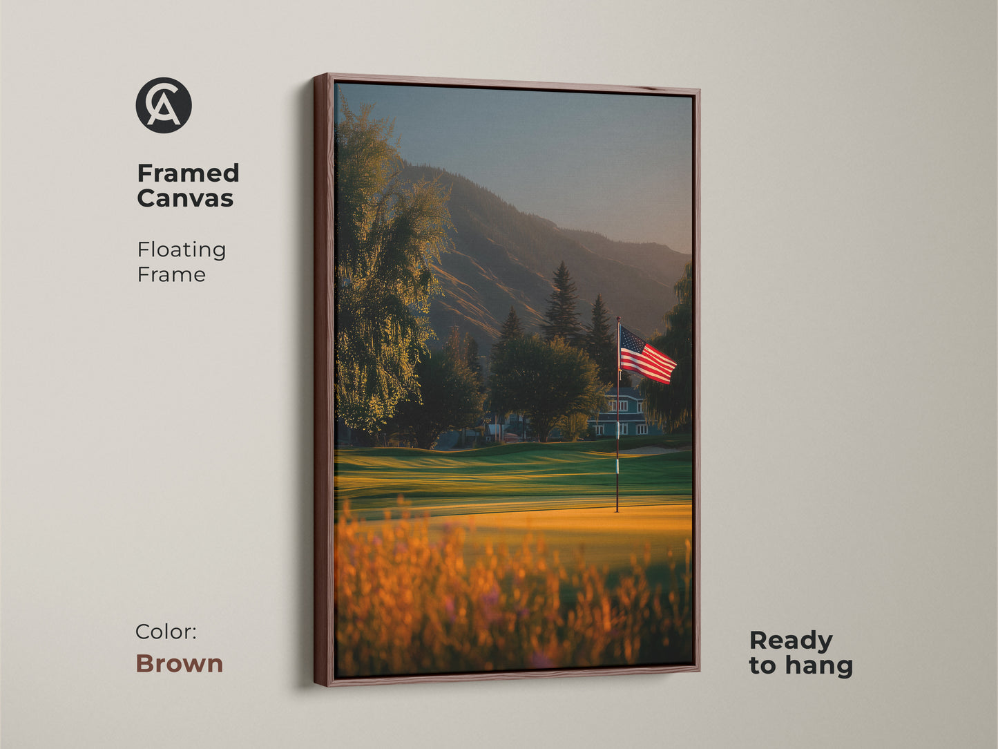 Brown framed canvas art displaying an American flag on a scenic golf course. The floating frame adds depth to the artwork. This piece is ready to hang. Bring warmth and patriotism to your home decor.