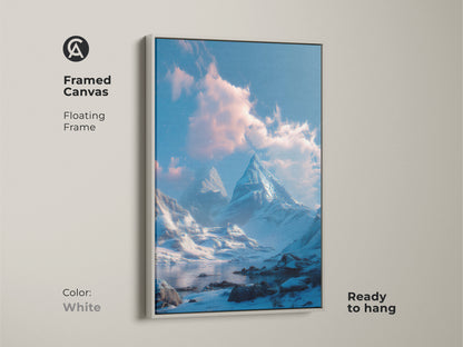 Framed canvas artwork of a winter mountain landscape with a floating frame. The white frame offers a clean modern look to the serene snow-covered mountain scene. Ready to hang this piece brings a fresh touch to any decor.