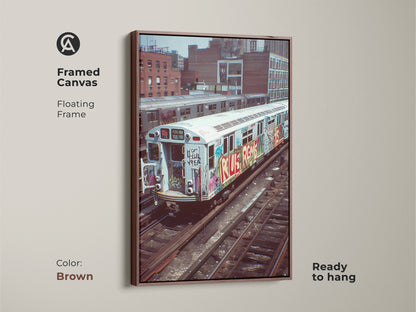 Brown framed canvas showcasing a graffiti subway train. This urban street artwork is ready to hang. The industrial loft wall decor brings a cityscape indoors. Ideal gift for hip hop fans and art lovers.