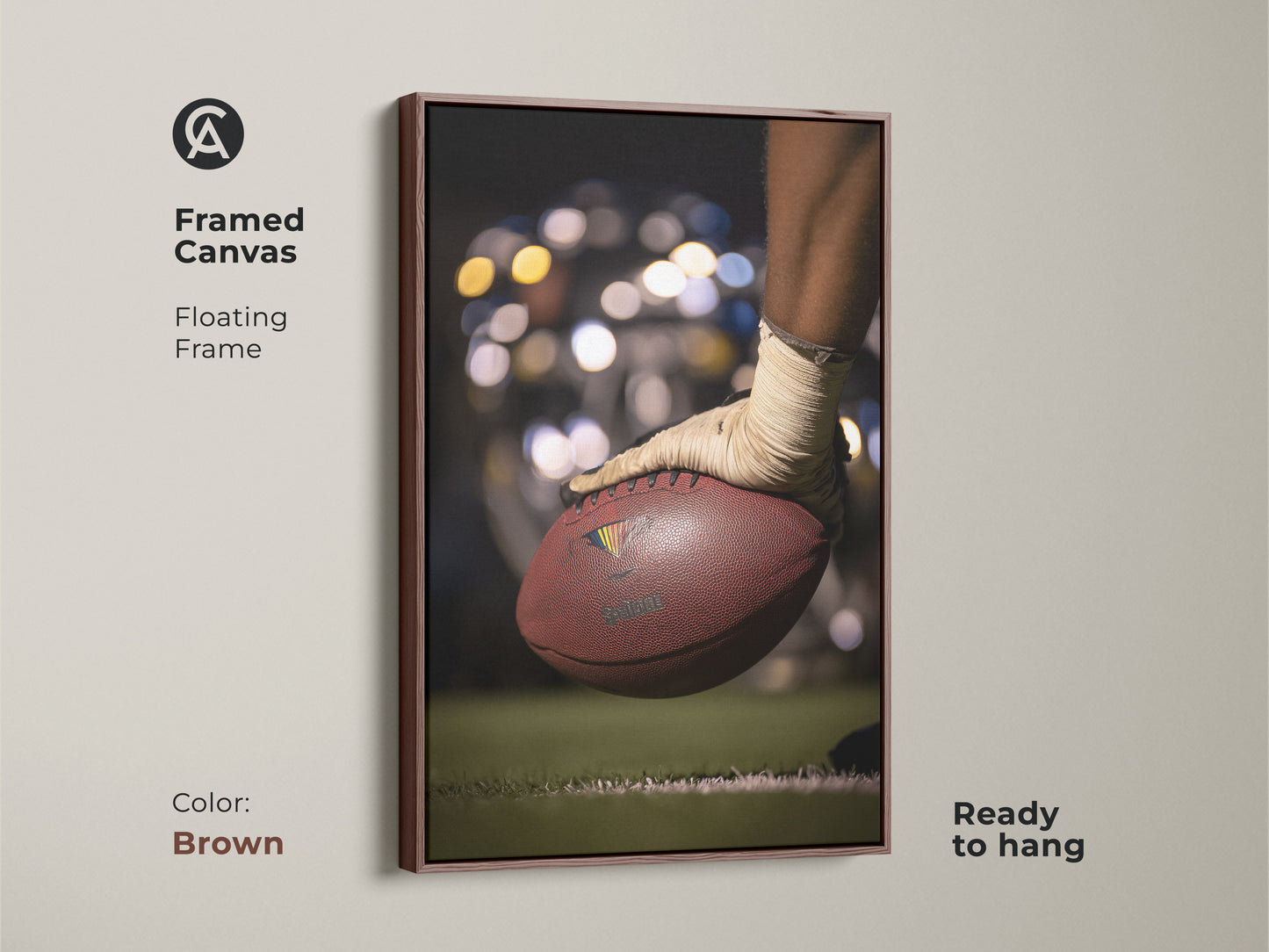 A framed canvas with a football theme is displayed. The floating frame enhances its visual appeal. The brown frame complements the artwork's warm tones. It is ready to hang for easy integration into your space. A great gift for sports fans and masculine home decor.
