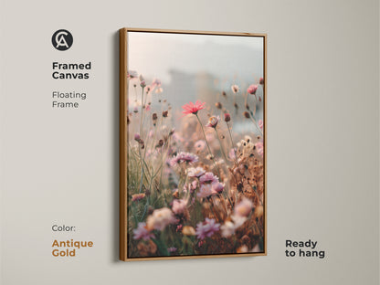 Framed Canvas in antique gold with a floating frame showcasing Soft Focus Floral Art Print. This coral pink daisy and cosmos botanical wall art adds boho blush pink to any room. Ready to hang and makes a great housewarming gift.