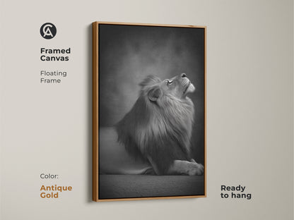 Framed canvas featuring a photorealistic lion in a antique gold floating frame. This monochrome animal artwork is ready to hang. A contemporary lion artwork for bedroom or office decor. Elegant animal art print.
