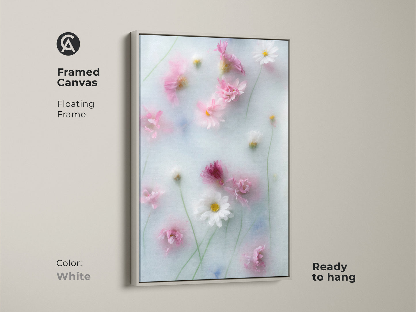 Framed canvas featuring soft focus pink daisy and cosmos flowers. This dreamy botanical art with a white floating frame is ready to hang. The pastel blue wall art adds a Scandinavian touch to your decor. A gentle flower artwork for your home.