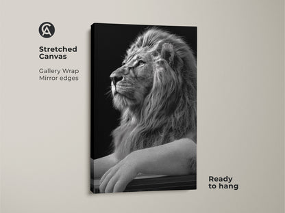 Stretched canvas featuring a black and white lion print with gallery wrapped mirror edges. This animal canvas art arrives ready to hang. Ideal wildlife wall decor for a contemporary or modern space.