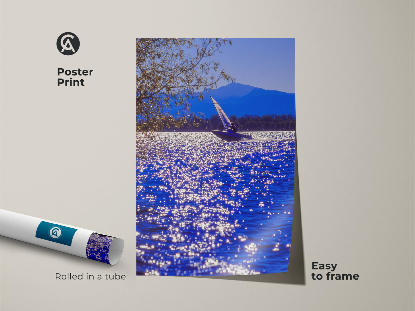 This is a poster print of a sailboat on deep blue water. The art features a mountain view in the background. The rolled nautical art is easy to frame. Add a touch of the sea to your home decor with this maritime artwork.