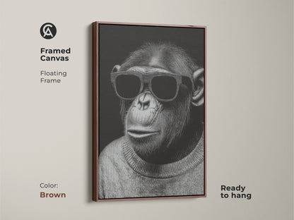 Framed canvas featuring a chimpanzee with sunglasses. The floating frame is brown and ready to hang. This monochrome animal portrait is minimalist line art. It is a unique statement for animal lovers. The cool chimpanzee poster complements contemporary decor.