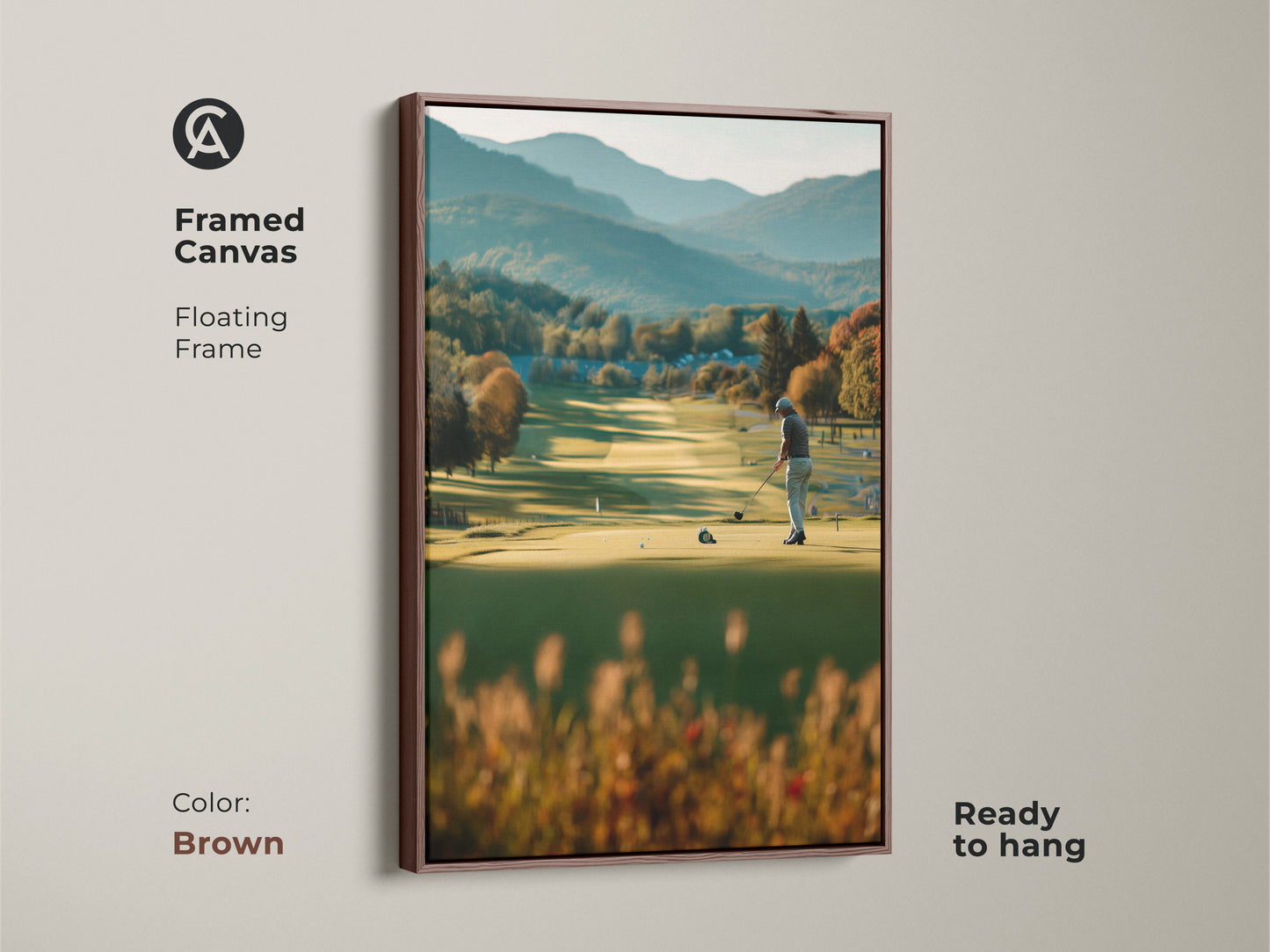 Elevate your home decor with this framed canvas golf artwork. This artwork portrays a golfer on a lush course with mountains in the distance. The brown floating frame complements the scene's natural tones. Ready to hang and admire.