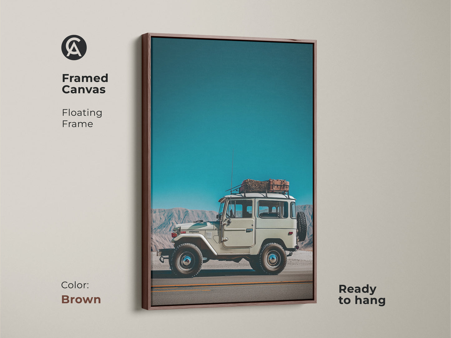 Framed canvas displays a vintage SUV with a brown floating frame. This retro mountain landscape artwork is ready to hang. The teal sky blue adventure photography suits an industrial loft.