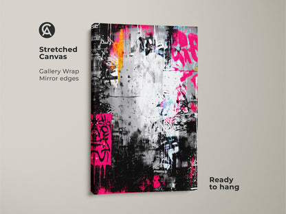 A stretched canvas featuring graffiti art. The artwork has vibrant pink and orange colors with a black and silver backdrop. Ready to hang this gallery-wrapped canvas adds a modern touch.
