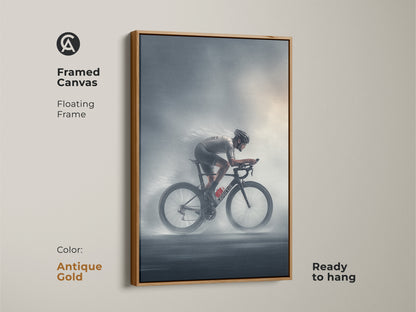 Framed canvas art of a road cyclist in action with a floating frame in antique gold. The charcoal grey artwork adds a touch of elegance to any space. Ready to hang this sports canvas is perfect for a modern man cave or gym. A great gift idea for a cycling enthusiast.
