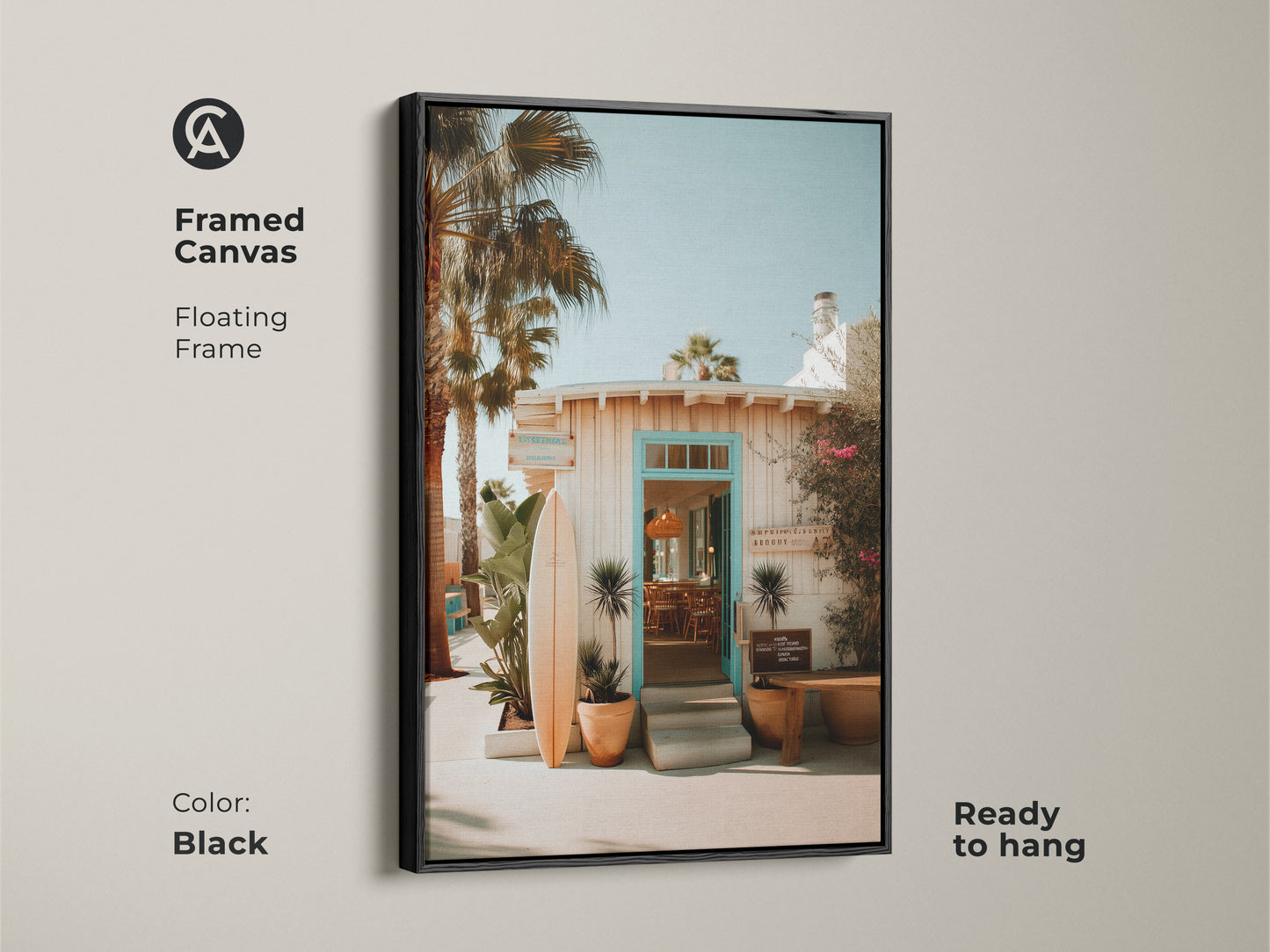 Framed canvas art with a floating black frame showing a beach resort entrance. The surfboard gives a coastal feel. Ready to hang for instant enjoyment. The black frame adds a modern touch to this tropical artwork.