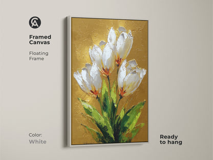 Framed botanical artwork featuring white tulips and gold leaf accents. A white floating frame enhances its modern aesthetic. Perfect for adding a sophisticated touch to any room.