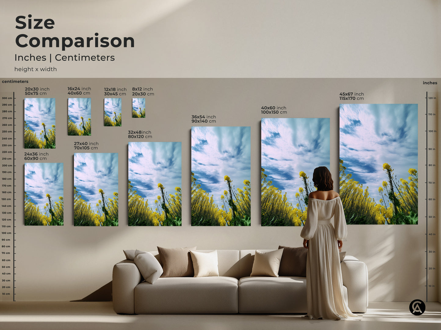 Size comparison of the yellow canola field artwork in inches and centimeters. Artwork is displayed in various sizes above a sofa to showcase scale. This impressionistic nature art is perfect for residential wall art. Find the ideal size to complement your living space and bring the beauty of a blooming canola field into your home.
