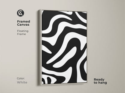 Framed canvas showcases an abstract zebra pattern with a white floating frame. This minimalist art complements contemporary interiors. The black and white print is ready to hang.