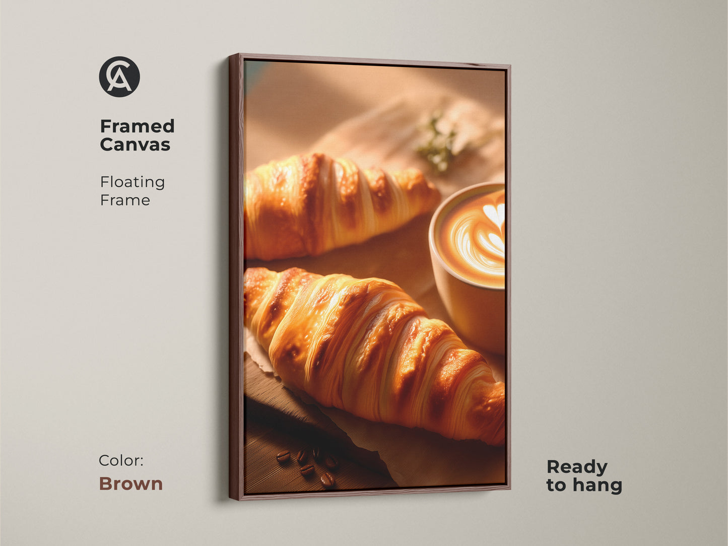 Framed Canvas with a brown floating frame showcasing croissant and latte art. The art is perfect as beige kitchen wall decor. Contemporary coffee art ready to hang in any modern space. Coffee lover gift idea.