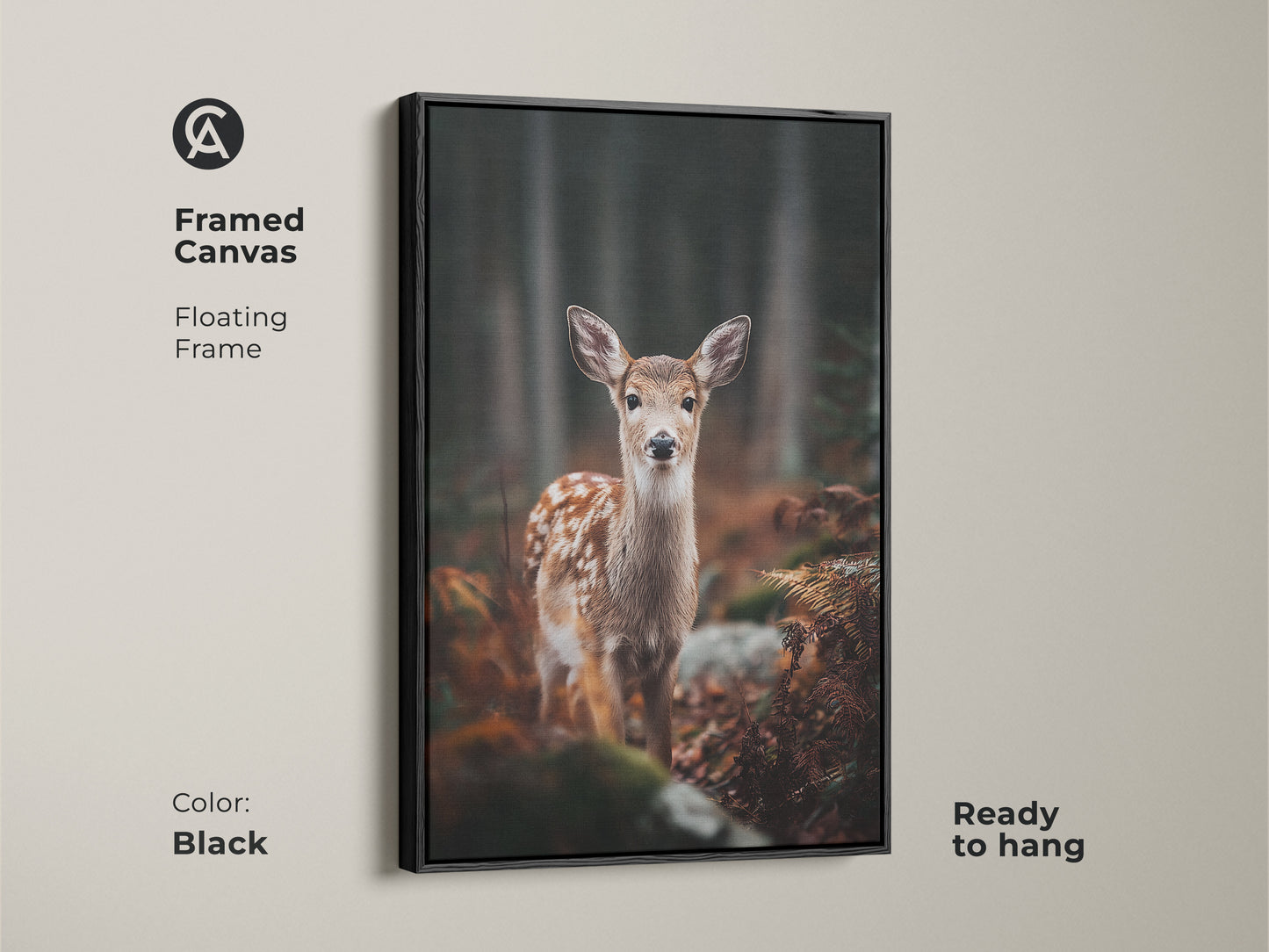 Framed canvas featuring a fawn in a forest. The black floating frame enhances this wildlife artwork. Ready to hang this rustic art suits any room. A great housewarming gift for nature enthusiasts.