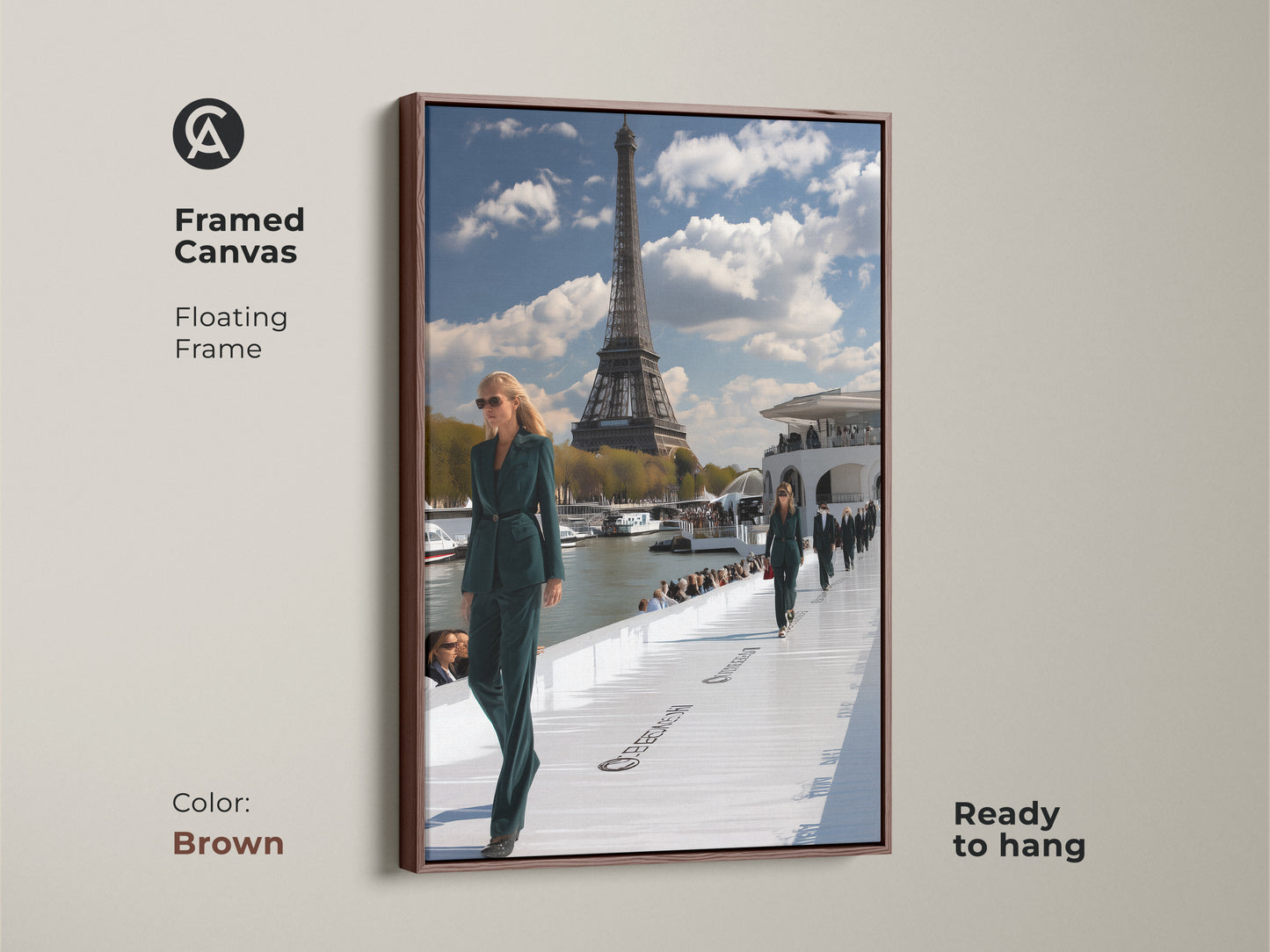Framed canvas print featuring a Paris fashion show with a floating brown frame. The artwork captures models in teal green outfits with the Eiffel Tower in the background. This contemporary piece is ready to hang enhancing your home or office decor. Perfect for adding Parisian elegance.