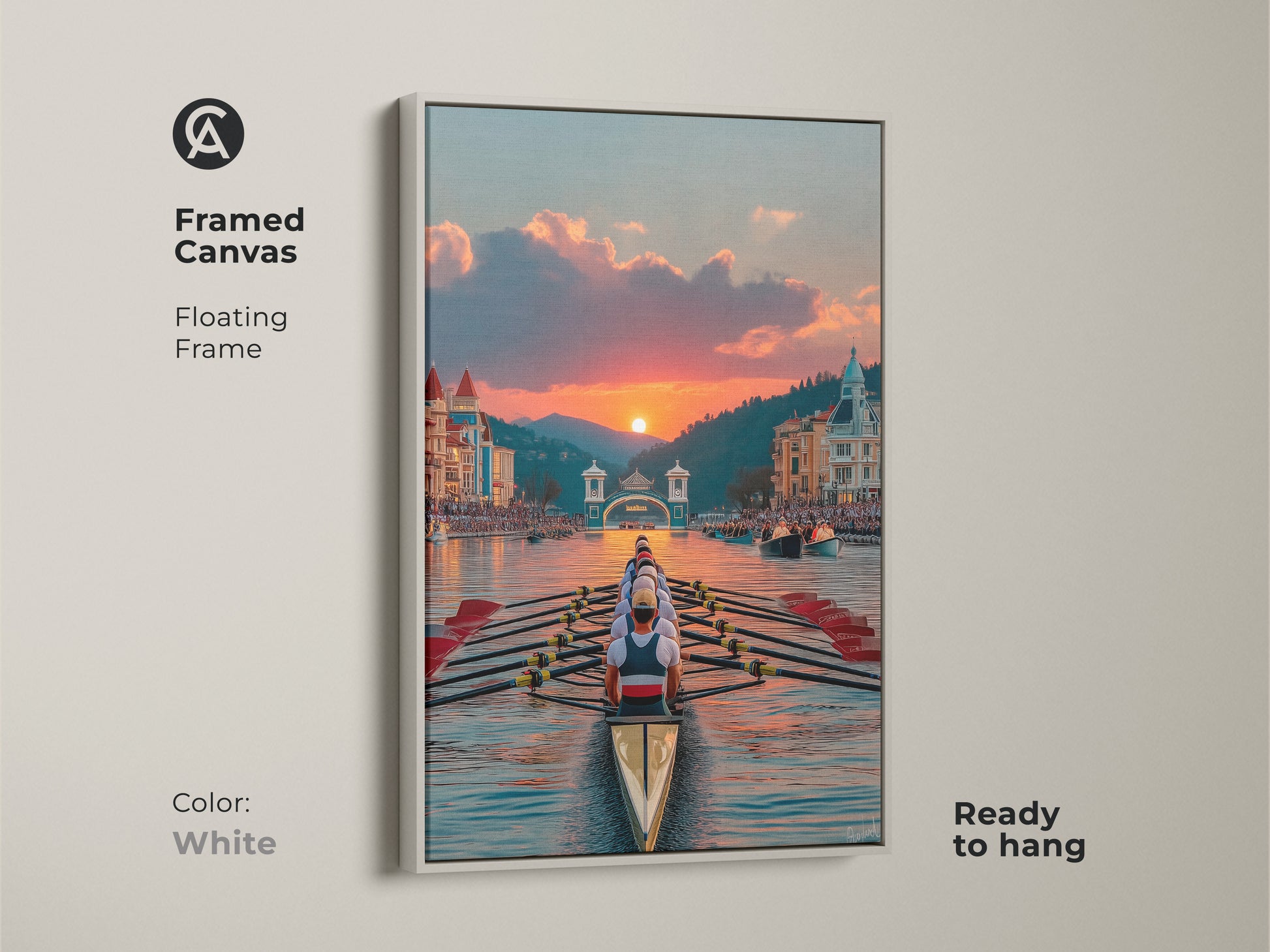 White Framed Canvas of a Rowing Boat Scene. The floating frame accents the picturesque sunset art. This nautical themed print is ready to hang. Brighten your space with this gift for competitive rower. Perfect for a home gym.