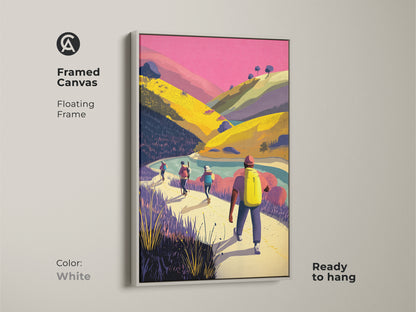 Framed canvas of hikers in a mountain landscape with a white floating frame. This adventure travel print is ready to hang. The pink yellow and green artwork adds a touch of nature to any room. Perfect contemporary landscape for living room bedroom or home office. Ideal gift for hikers and outdoor lovers.