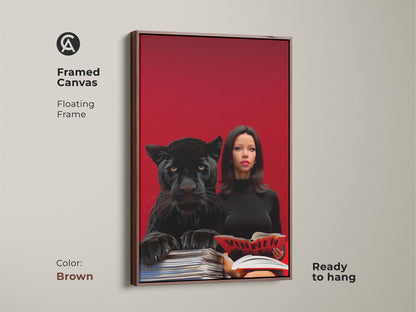 Framed canvas displaying a surreal pop art print. A woman reading alongside a black panther with a crimson backdrop. The brown floating frame adds warmth to this unique eclectic office art piece.