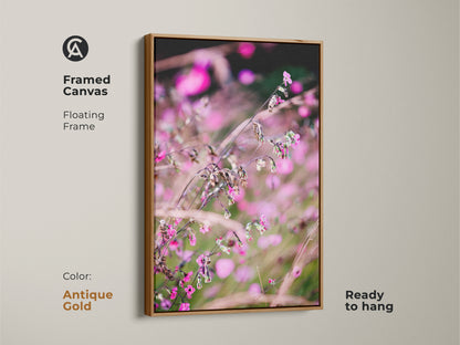 Framed canvas showcasing a pink wildflower macro photo. Antique gold floating frame enhances the boho botanical wall art. This nature art is ready to hang. It's a perfect housewarming gift floral.