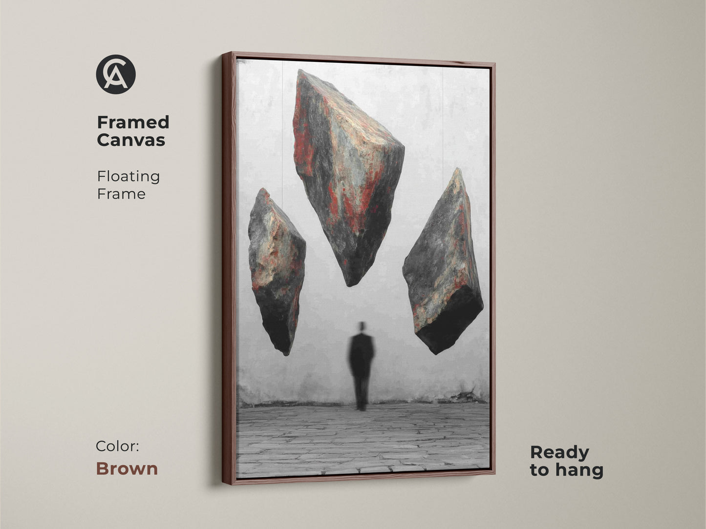 Brown framed canvas art displays surreal floating rocks with a man silhouette. This conceptual art is a red black gray abstract artwork. This unique housewarming gift has a floating frame. It's ready to hang for a thought-provoking decor piece. Ideal as abstract office decor or study room wall art.