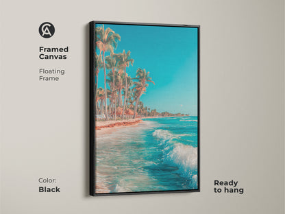 Framed canvas print with a floating frame in black. Tropical beach art featuring ocean waves and palm trees. This ready to hang artwork will bring coastal charm to your space. The Canvas is Ready to hang.