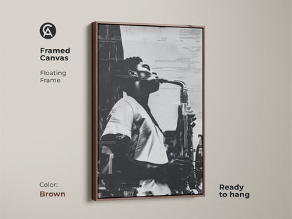 Framed canvas artwork featuring a musician playing saxophone. The brown floating frame adds a touch of warmth. This black and white musical art is ready to hang. Ideal for jazz enthusiasts and art collectors.