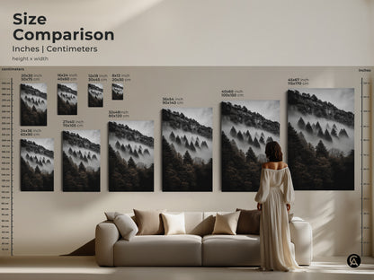 Size comparison of dark green forest art. Inches and centimeters are shown. See how the art looks above a sofa and with a person for scale. Find the perfect size for your monochrome mountain wall art from 20x30 cm to 115x170 cm. Perfect black and grey wall art.