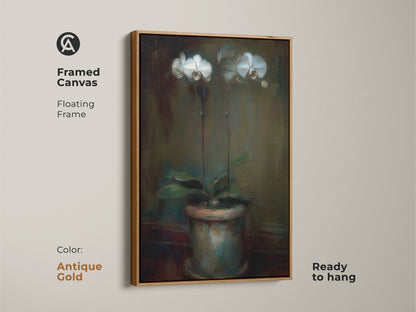 Framed canvas of an emerald green orchid artwork with an antique gold floating frame. Ready to hang contemporary botanical decor. This floral canvas art enhances any space. A sophisticated gift for plant lovers. The potted plant artwork adds elegance.