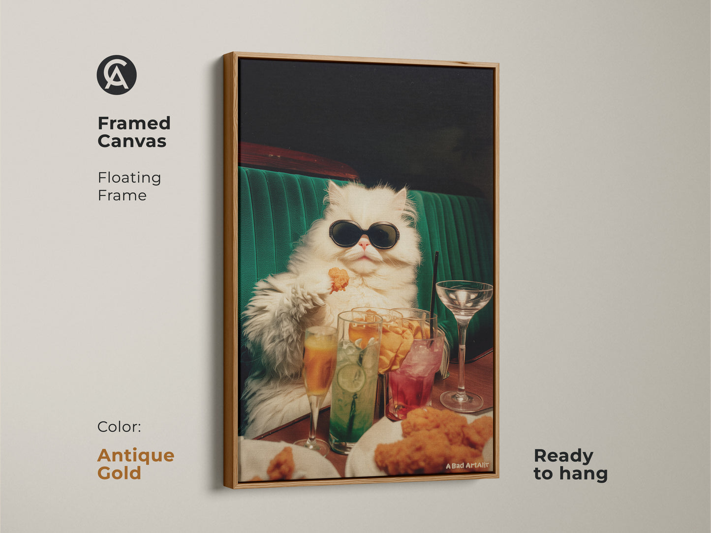 Framed canvas artwork of a persian cat in sunglasses. The floating frame is antique gold. The cat is seated at a table filled with drinks and chicken nuggets. This funny art is ready to hang in your home.