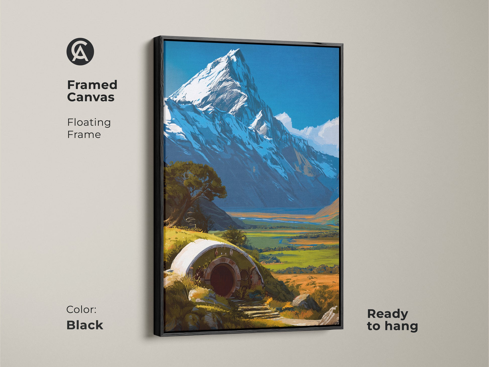 Framed canvas showcasing a fantasy hobbit hole artwork with a black floating frame. The snowy mountain and green hills art is ready to hang. Ideal for a home office or living room wall art.