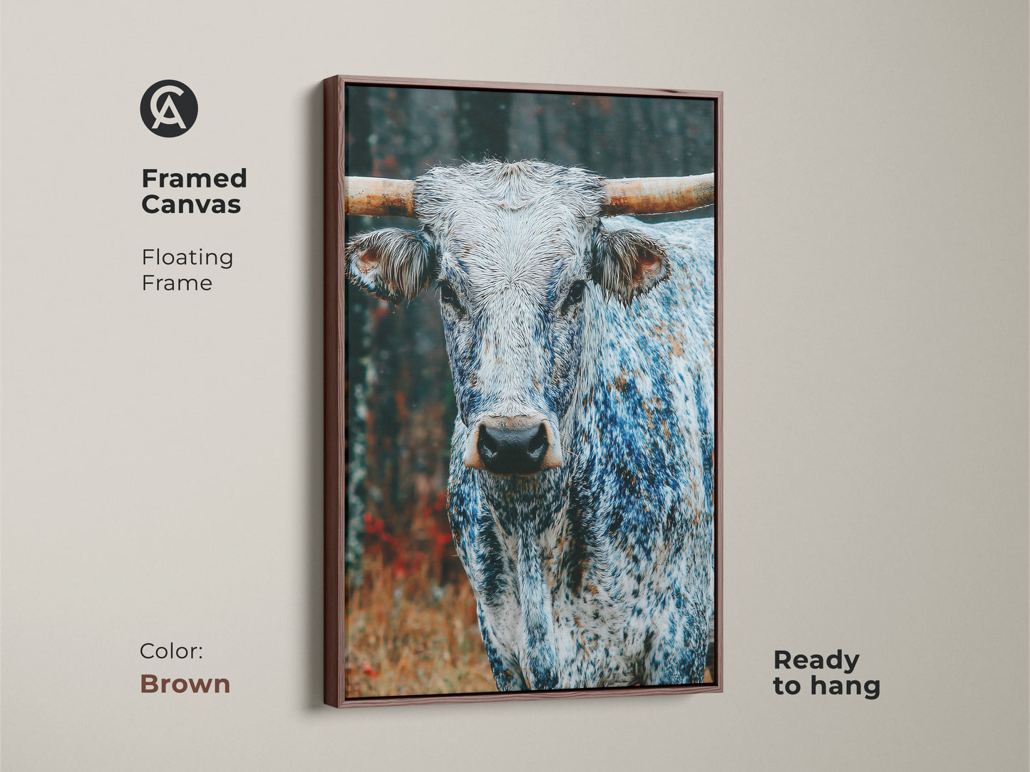 Framed canvas art featuring a Longhorn. The floating frame is brown. This ready-to-hang piece adds warmth. The animal's unique coloration stands out. This artwork is a great conversation starter. The brown frame complements the subject.
