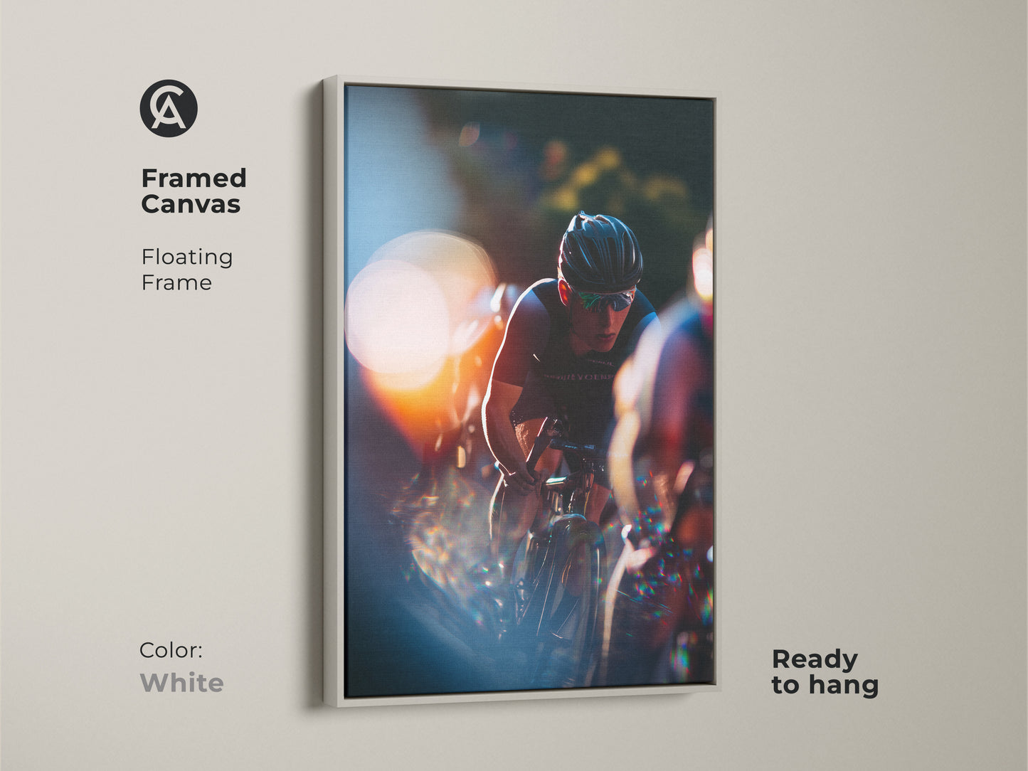 Framed canvas of cyclist in action. White floating frame provides a clean look. Ready to hang for immediate enjoyment. Contemporary sports art with orange and blue accents. Perfect for a modern home or office. Dynamic cycling decor.