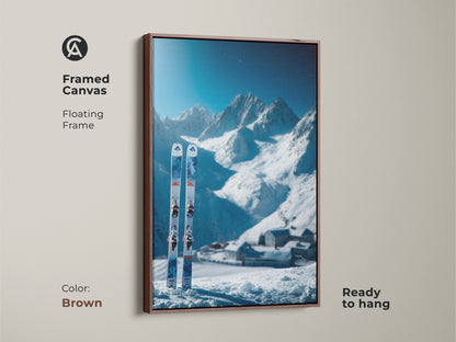 Framed canvas art of a ski scene. A winter mountain scene is the backdrop. The skis are in the snow. The frame is brown and floating. Buy this framed ski canvas art today.