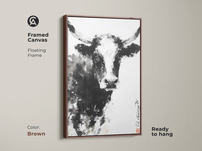 This is a framed canvas with a brown floating frame. The artwork is ready to hang. It features an ink wash painting of a bull. The combination of rustic and modern creates a unique piece. Add this beautiful artwork to your home.