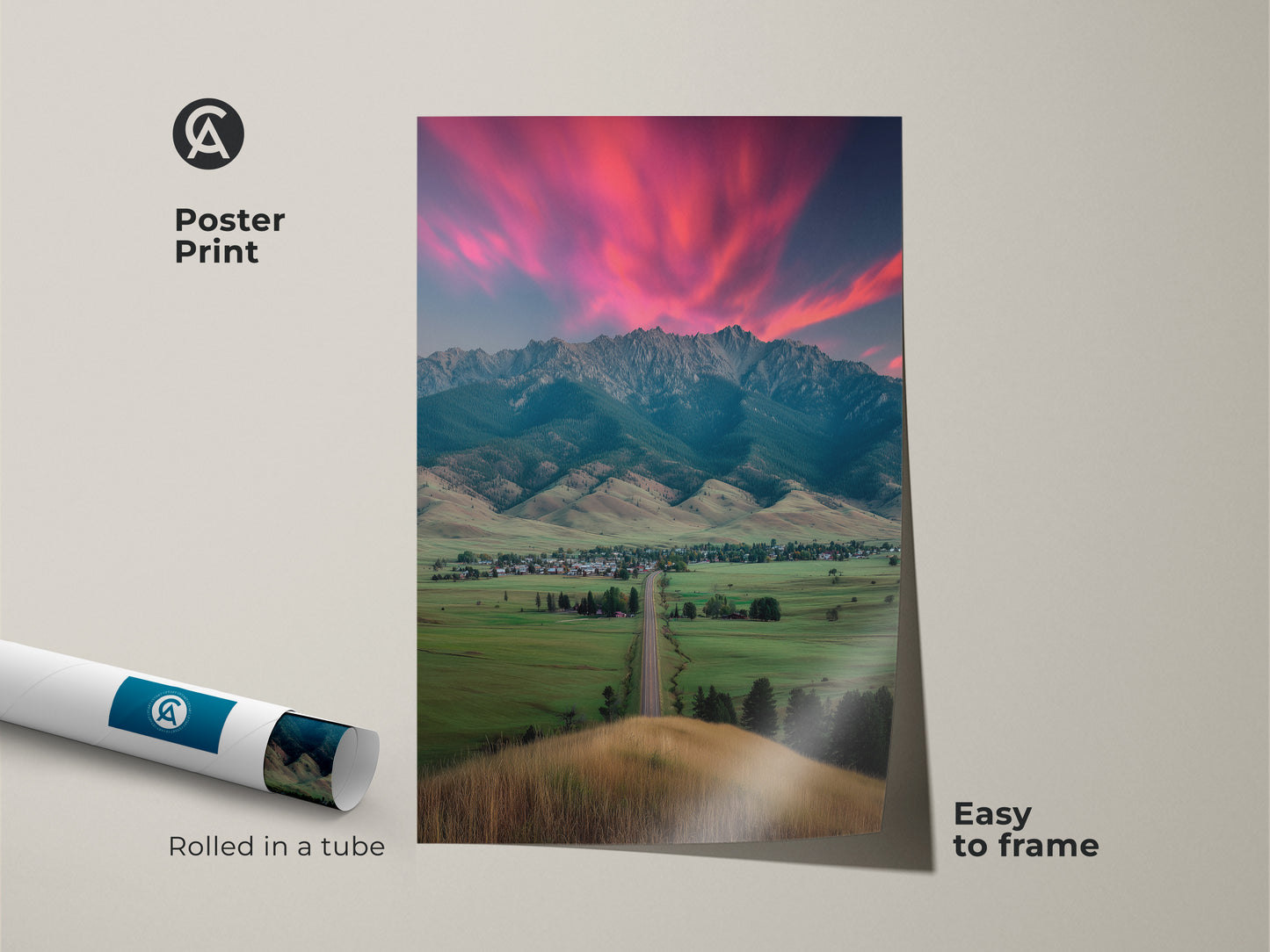 Pink sunset mountain landscape poster print rolled in a tube. This scenic wall art is easy to frame and perfect for any room. Evokes modern farmhouse decor. Ideal as a housewarming gift for outdoor lovers. Landscape wall art brings nature indoors