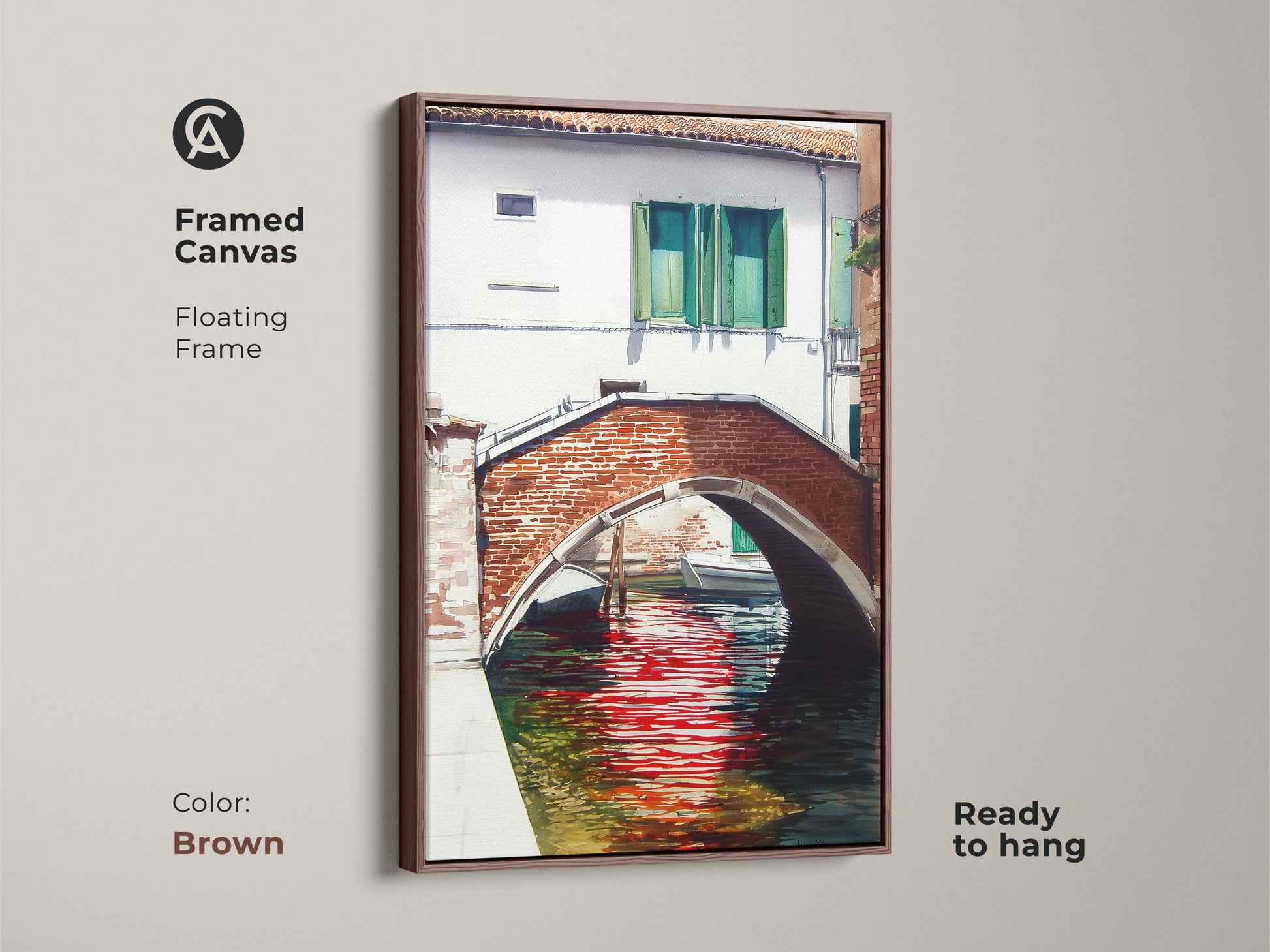 Framed canvas showcases a traditional Venetian canal scene with a red brick bridge. The brown floating frame highlights the European cityscape art. Ready to hang and perfect for adding charm to your home.