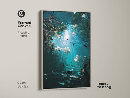 Framed canvas featuring underwater ocean wall art in a white floating frame. The deep blue fish canvas print is ready to hang. This marine life canvas print is perfect for ocean-themed rooms.