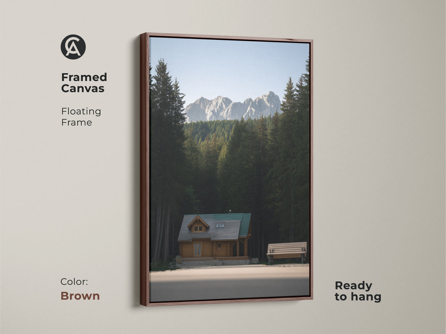 Framed Canvas art of a log cabin. This mountain forest canvas print features a floating frame in brown. It is ready to hang. The rustic home decor art brings an outdoor adventure to your wall.