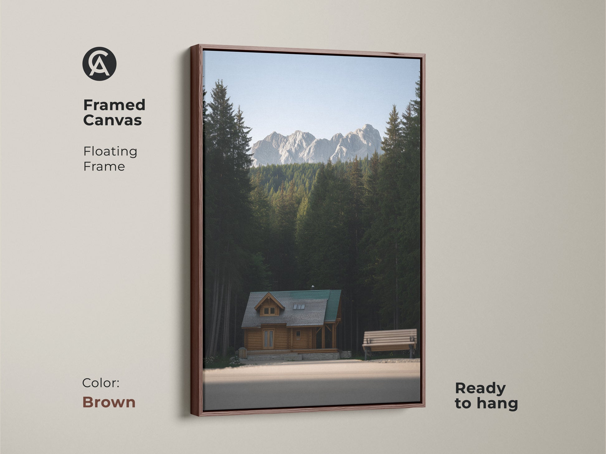 Framed Canvas art of a log cabin. This mountain forest canvas print features a floating frame in brown. It is ready to hang. The rustic home decor art brings an outdoor adventure to your wall.