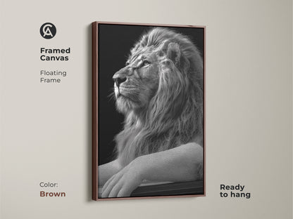 Framed monochrome lion canvas art with a brown floating frame. This animal canvas art adds a touch of regal elegance to any space. Ideal for home office wall decor and contemporary animal art.