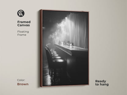 Framed canvas print of a monochrome bar. This floating frame is brown and ready to hang. The cinematic scene offers industrial decor. It's a black and white artwork for a lounge. This is perfect for home bar art.
